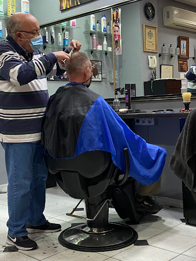 27081 manolo chano peluqueros